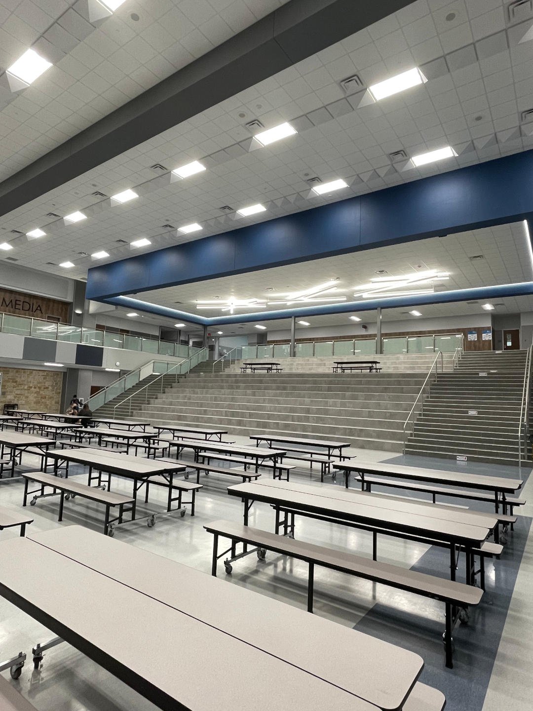 New Braunfels ISD – New Braunfels Middle School  New Braunfels Middle School is a 190,682 SF, two-story building on a 67 acre site.  Construction elements include a structural void form slab, steel frame, modified bitumen and standing seam roofing, porcelain tile, and LVT flooring.  The exterior is clad with face brick, natural stone, and metal panels.  The facility includes classrooms, wood floor gymnasiums, science labs, food service, administration, and fine arts areas.  On site improvements include concrete paving, covered walkways, site utilities, athletic fields, running track, and tennis courts.  Back to Portfolio 