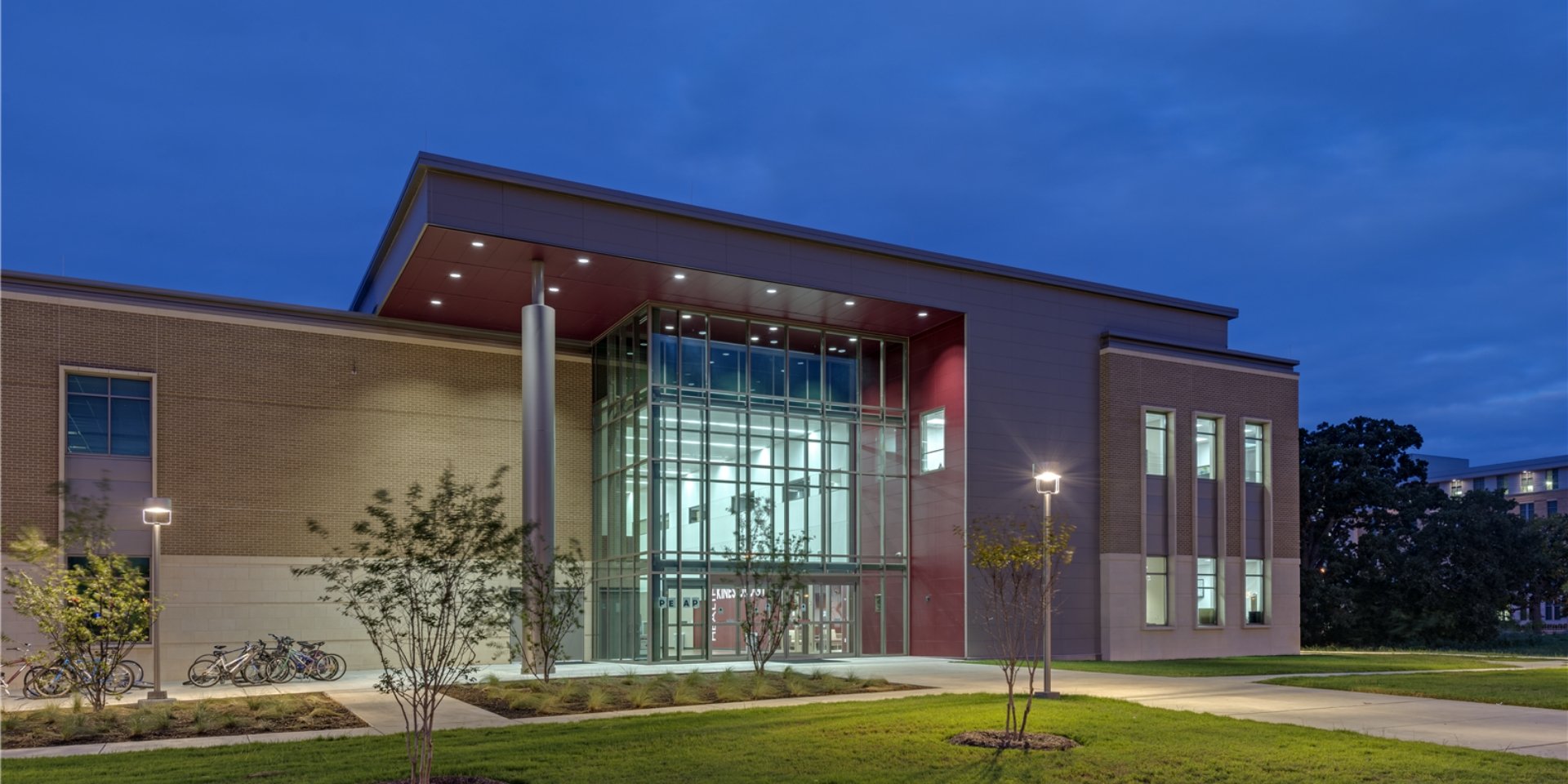 Texas A&amp;M University – PEAP Building  The Physical Education Activity Program (PEAP) Facility built on the campus of Texas A&amp;M University is a 113,800 SF facility containing both administration and athletic functions.&nbsp; The facility is intended to consolidate the Department of Health and Kinesiology’s spaces under one roof.&nbsp; The facility includes a multi-use gymnasium that contains (4) competition basketball courts, (6) volleyball courts, (12) badminton courts and indoor archery lanes in one clear span space with a second story balcony overlooking the gymnasium.&nbsp; Other functional spaces include gymnastics facilities, (3) weight rooms, indoor boot camp facility, fencing room and (3) dance rooms.  Back to Portfolio 